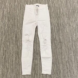 American Eagle Outfitters White Ripped Skinny Jeans